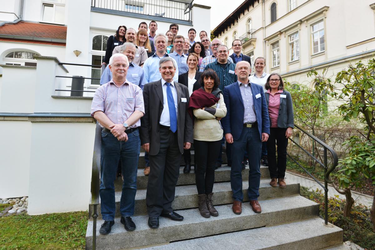 A group of participants of the FDSD meeting 2016 on the stairs in the backyard of QuoData